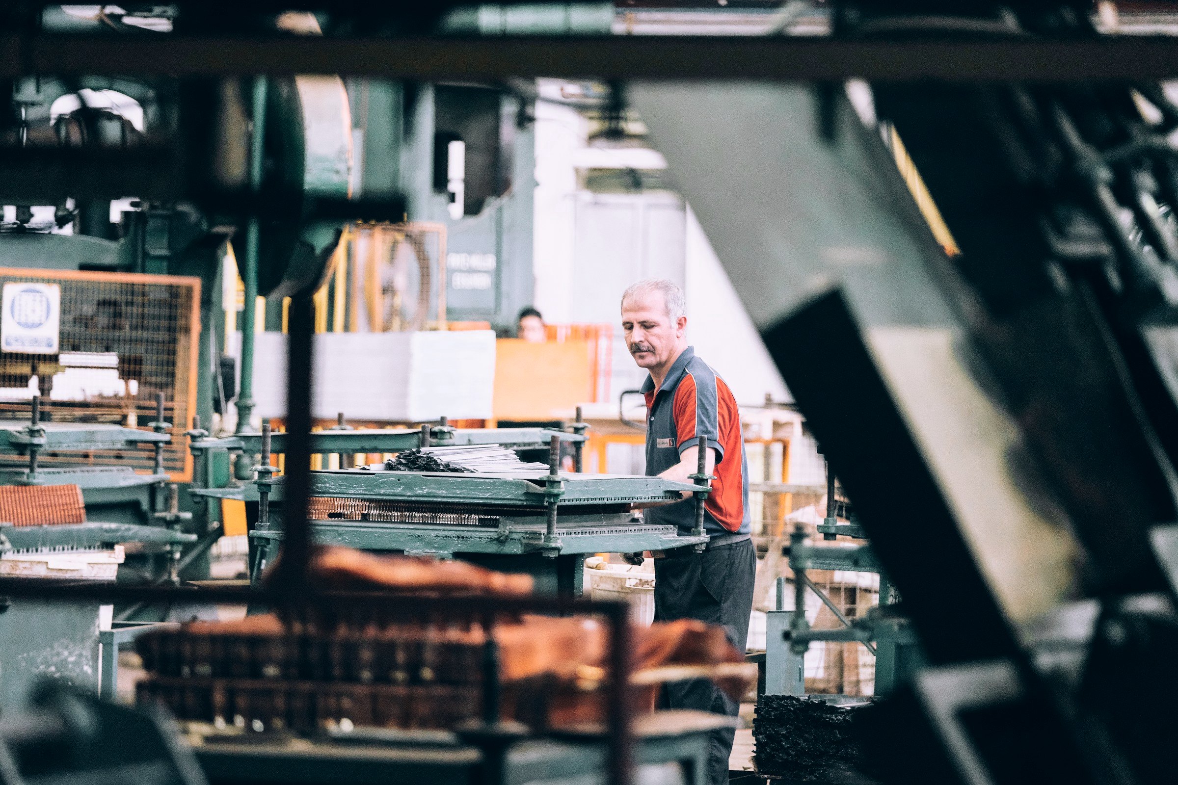Machinist at work on a factory floor